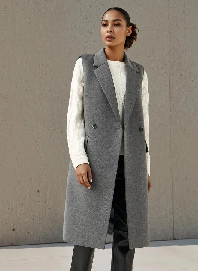 ايكونيك معطف ترنش بدون أكمام بياقة شق أيقونية